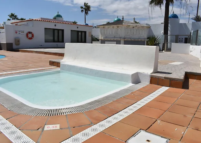 Almina Коральео