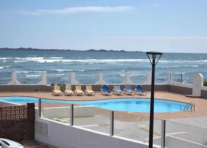 Almina Коральео